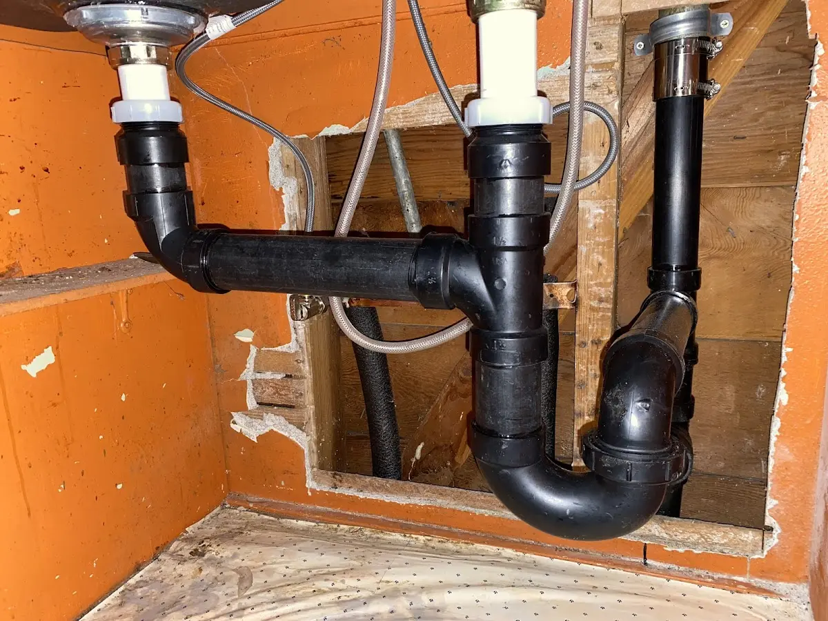 Professional Garbage Disposal Repair equipment and tools on the job in Kirkland